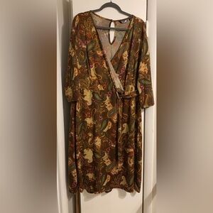 Partial wrap A-line Floral MIDI dress with paisley pattern and gold D-ring belt.
